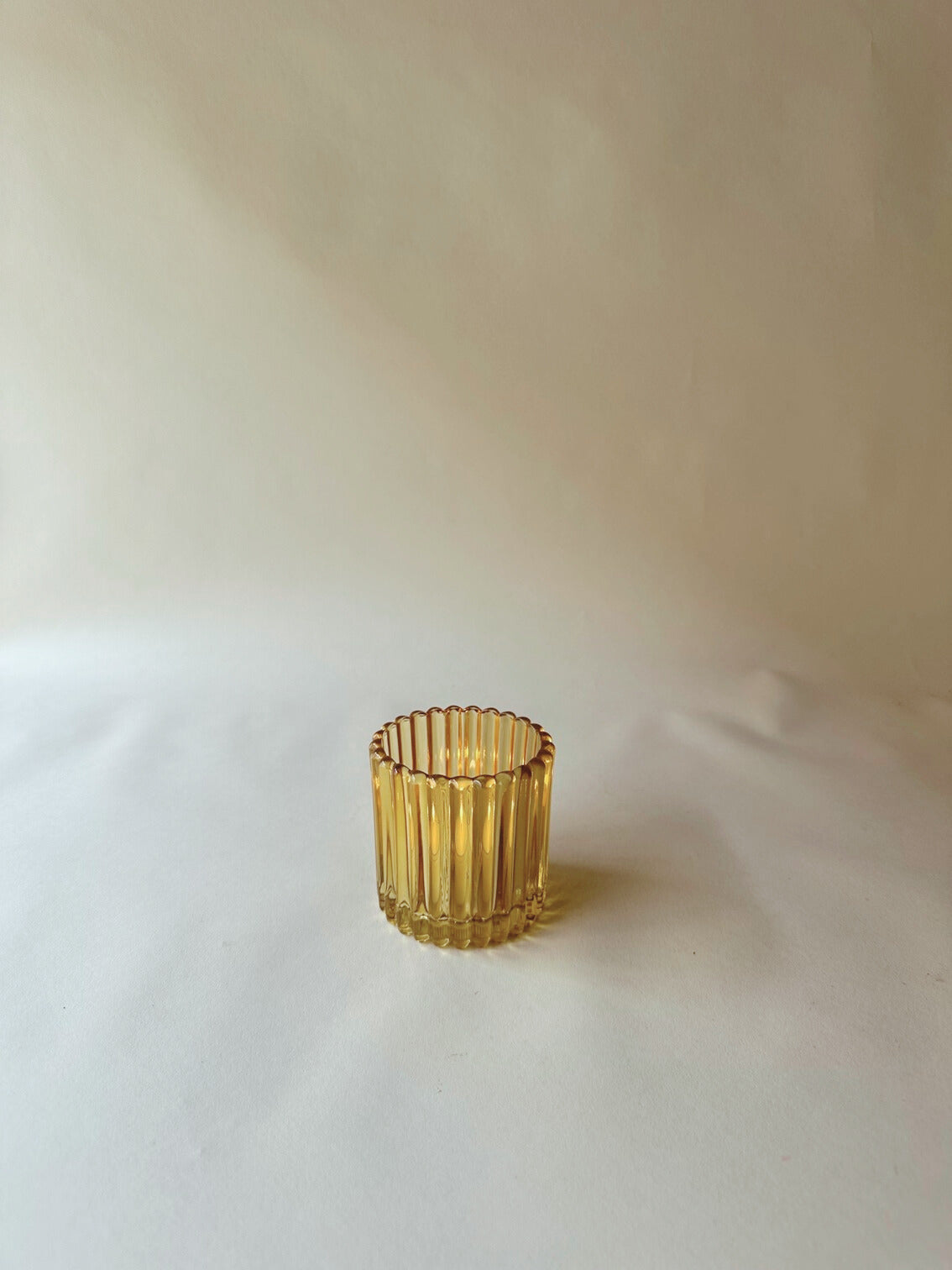 Pale tangerine ribbed votives