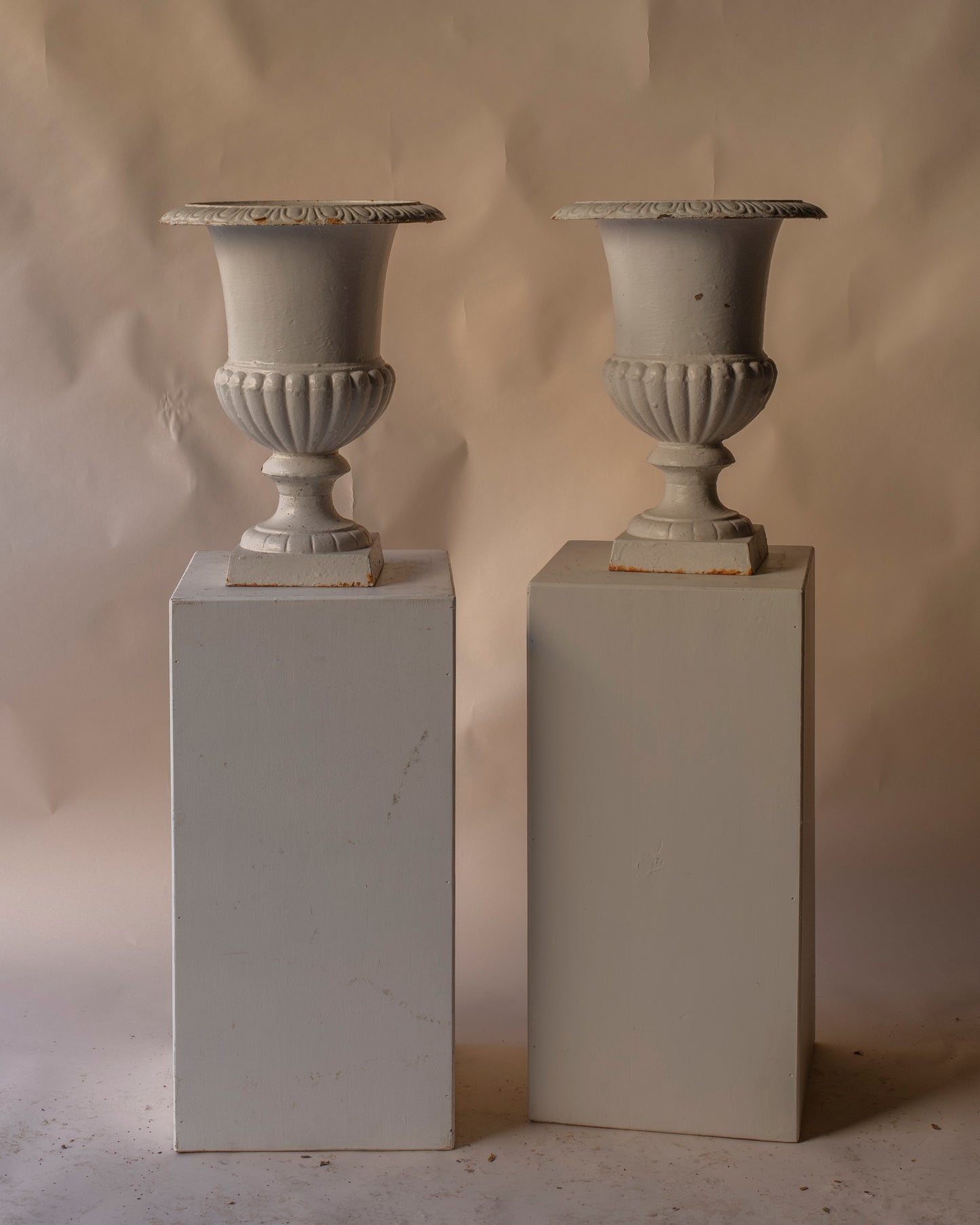 medium white cast iron urn