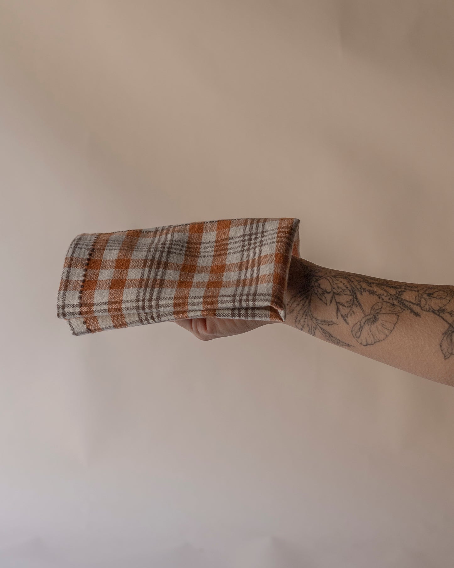 Burnt orange & off white check napkins