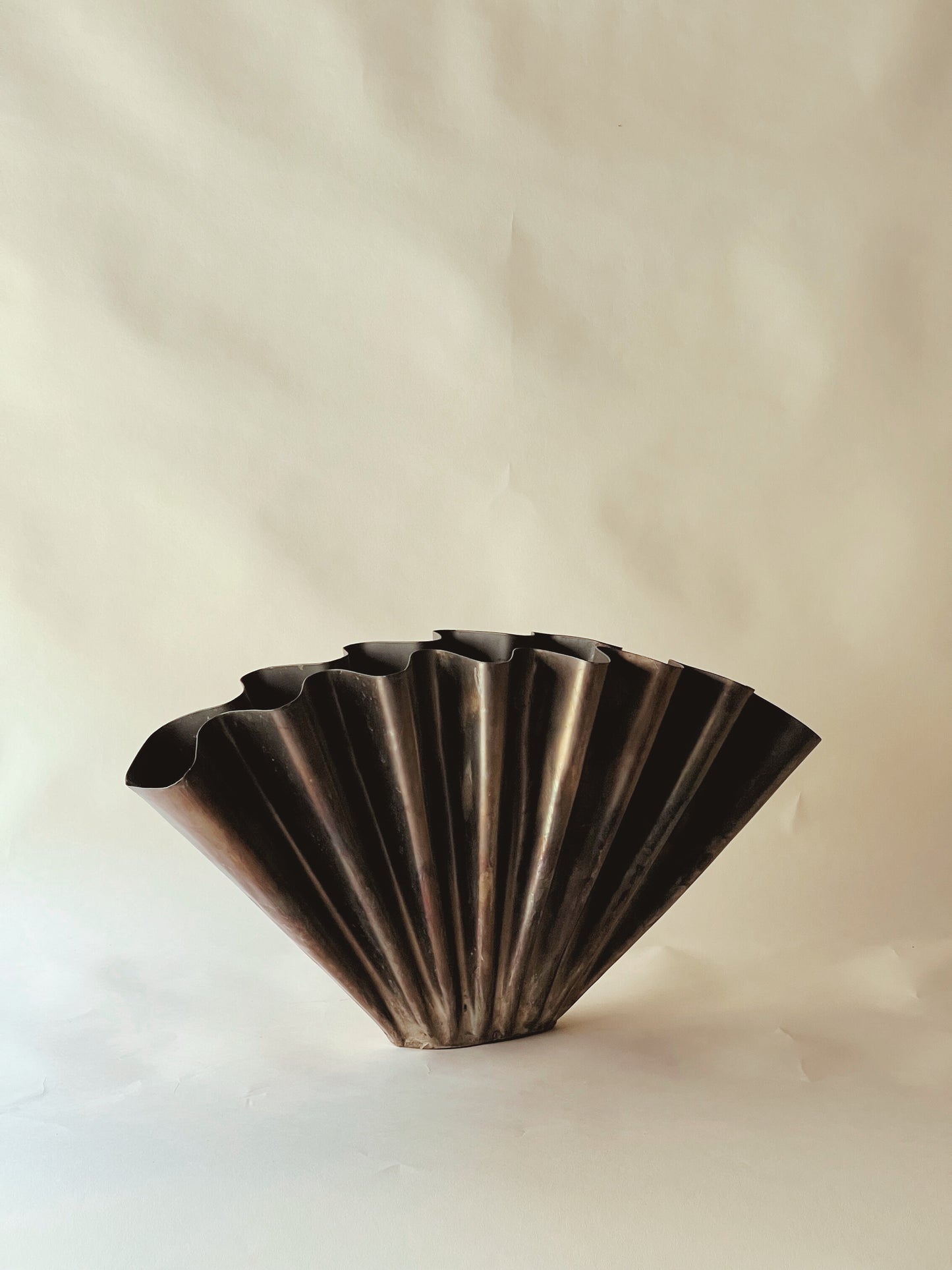 Metal wave vase