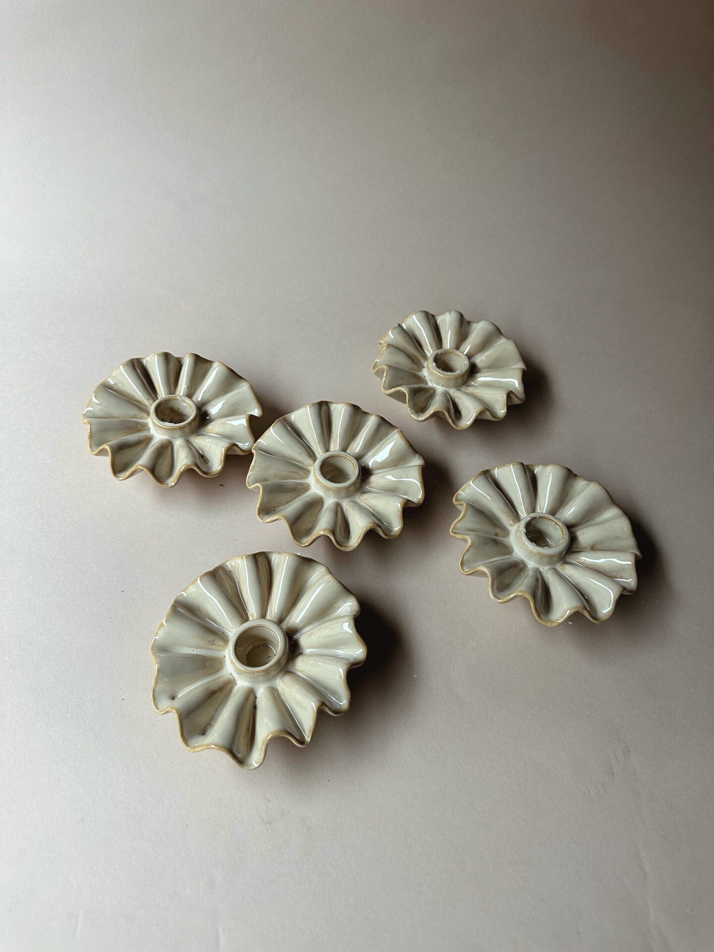 Wavy edged clay candle holders