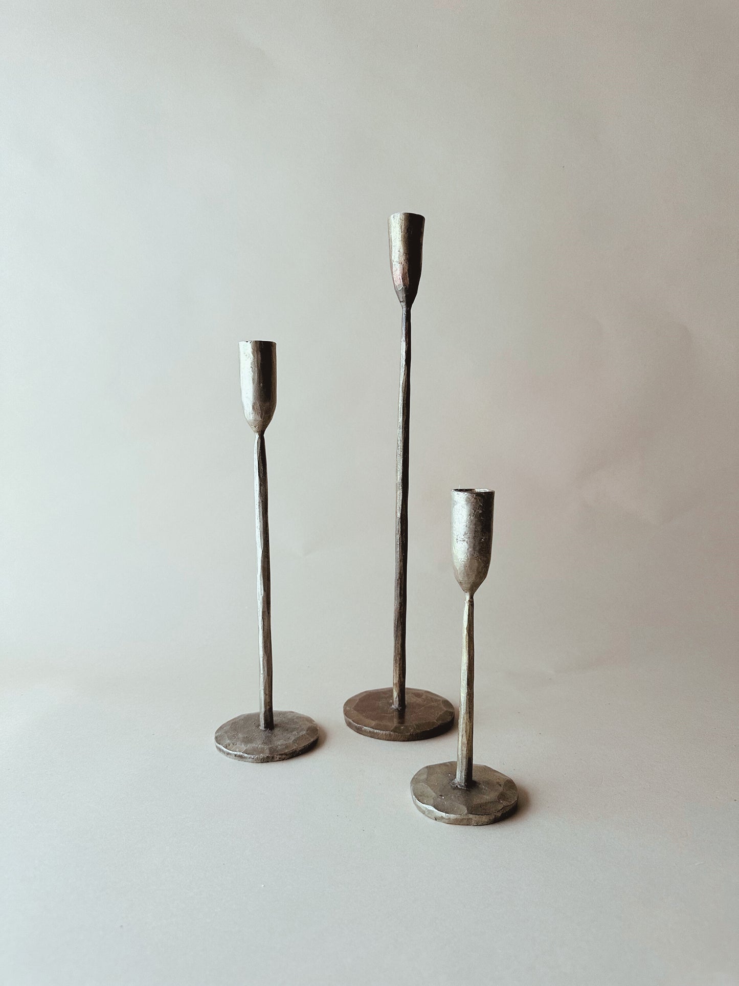 Brass contemporary candle sticks