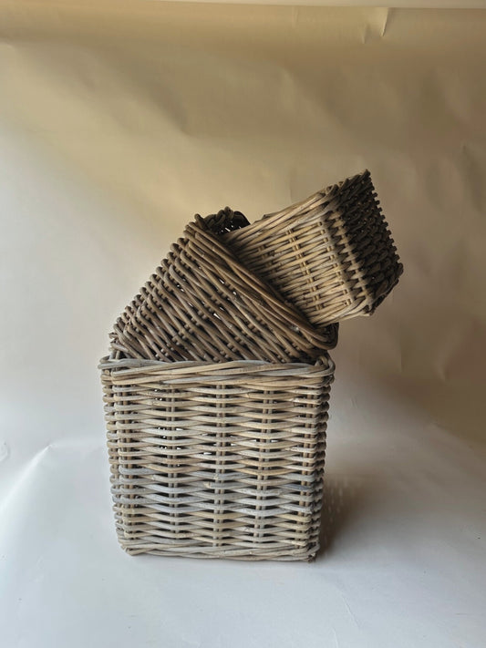 Trio of square wicker baskets