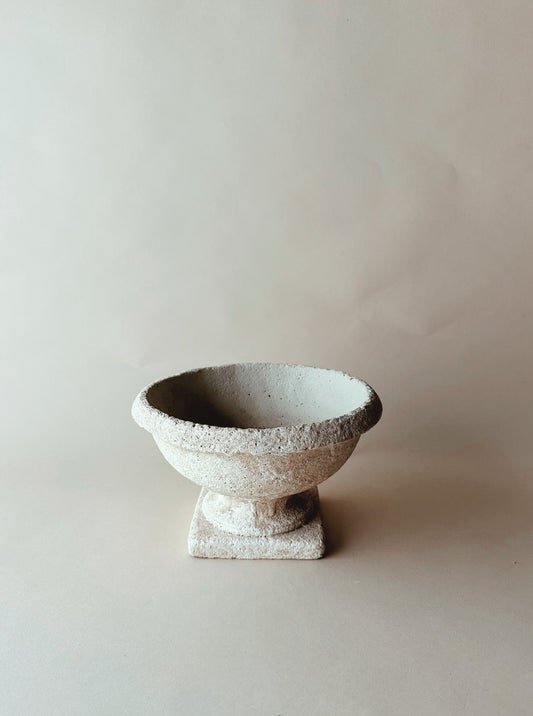 Low table top stone urn