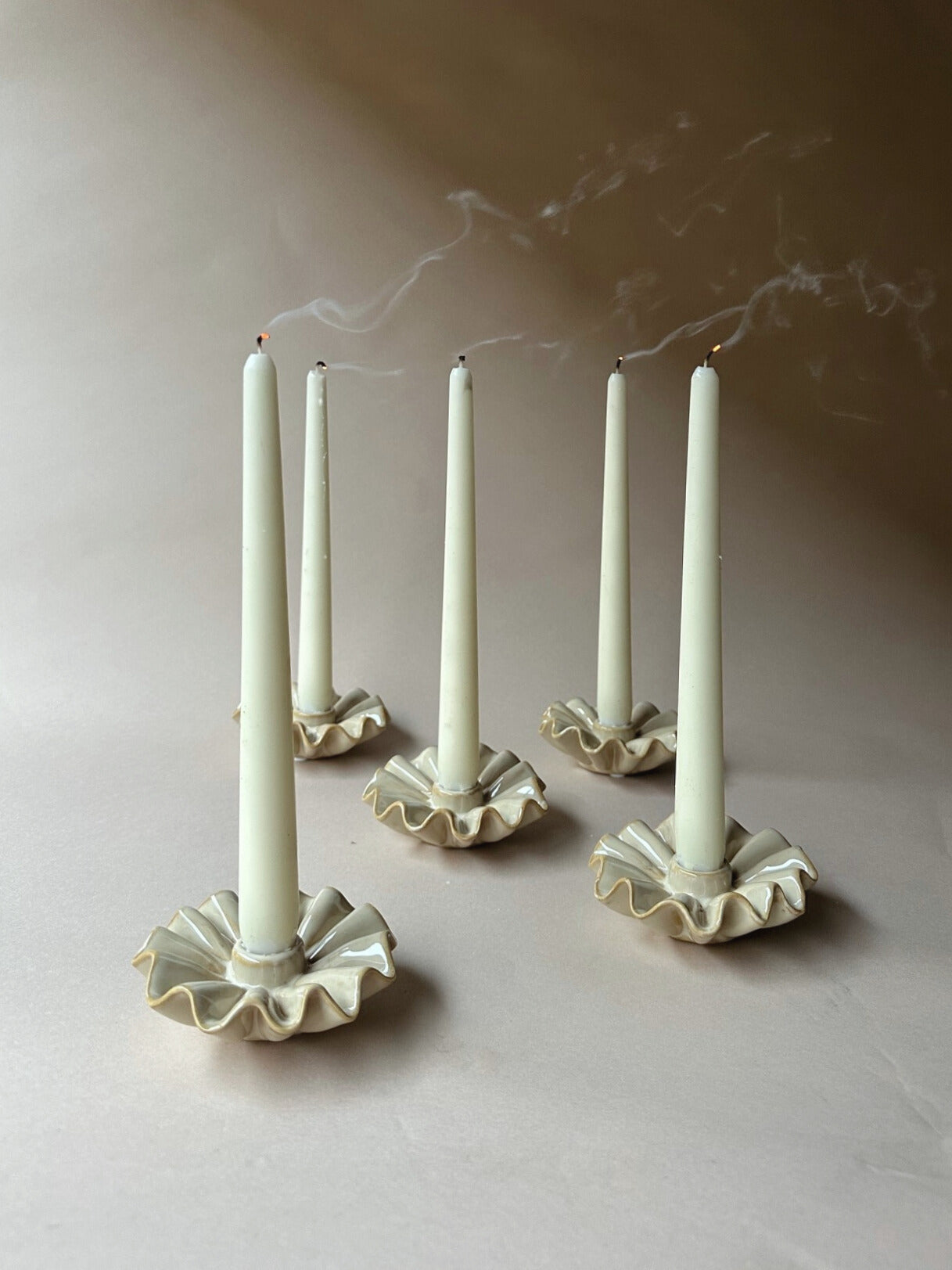 Wavy edged clay candle holders
