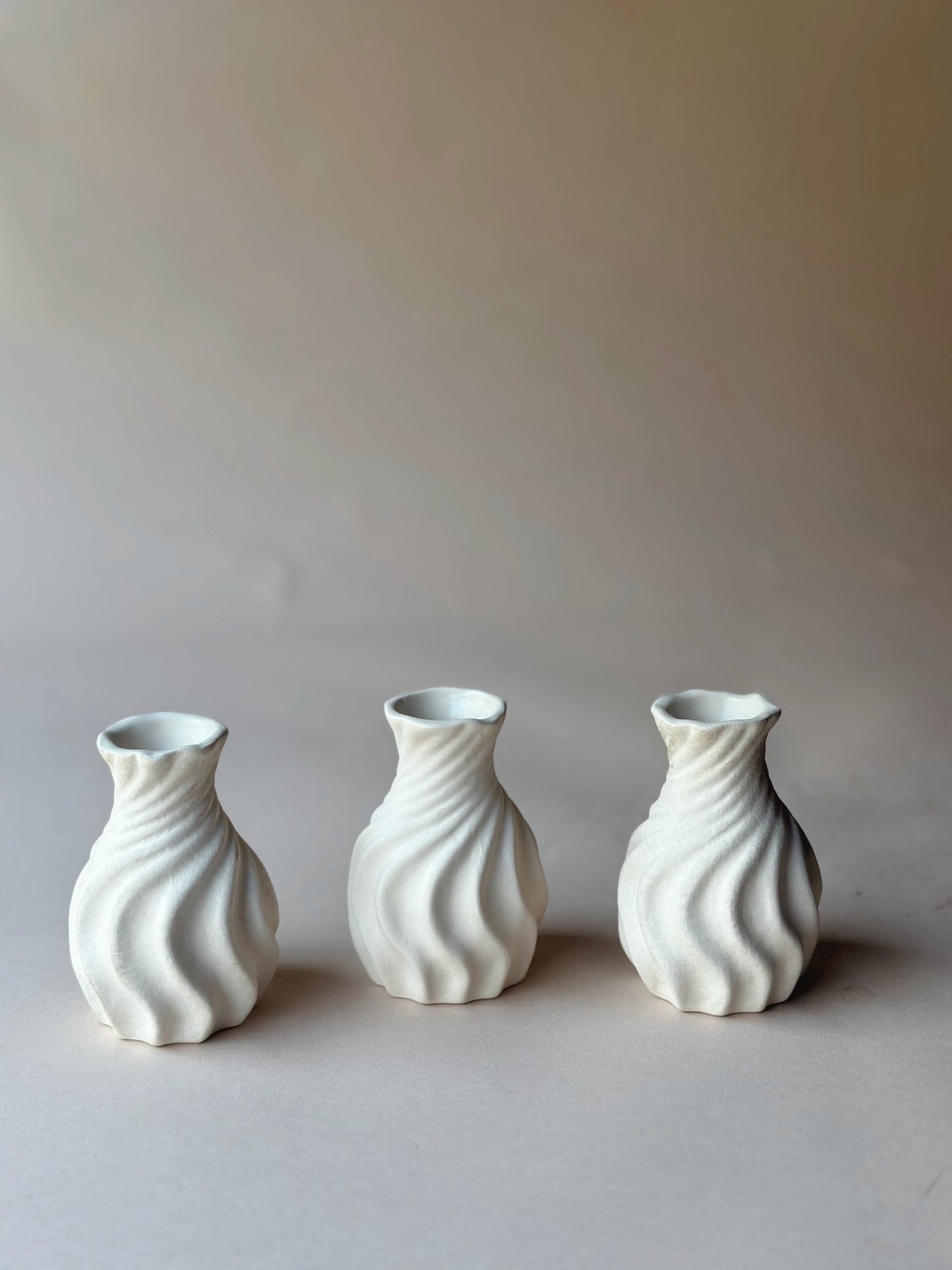 Textured swirl bud vases