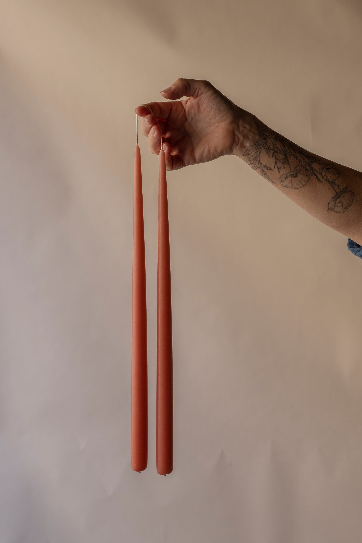 Dark terracotta taper dinner candles