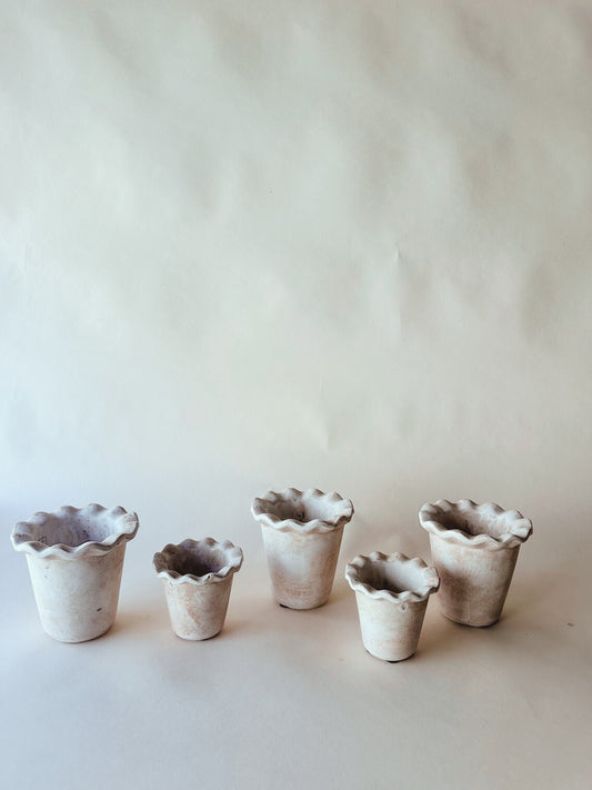 Frilly clay pots