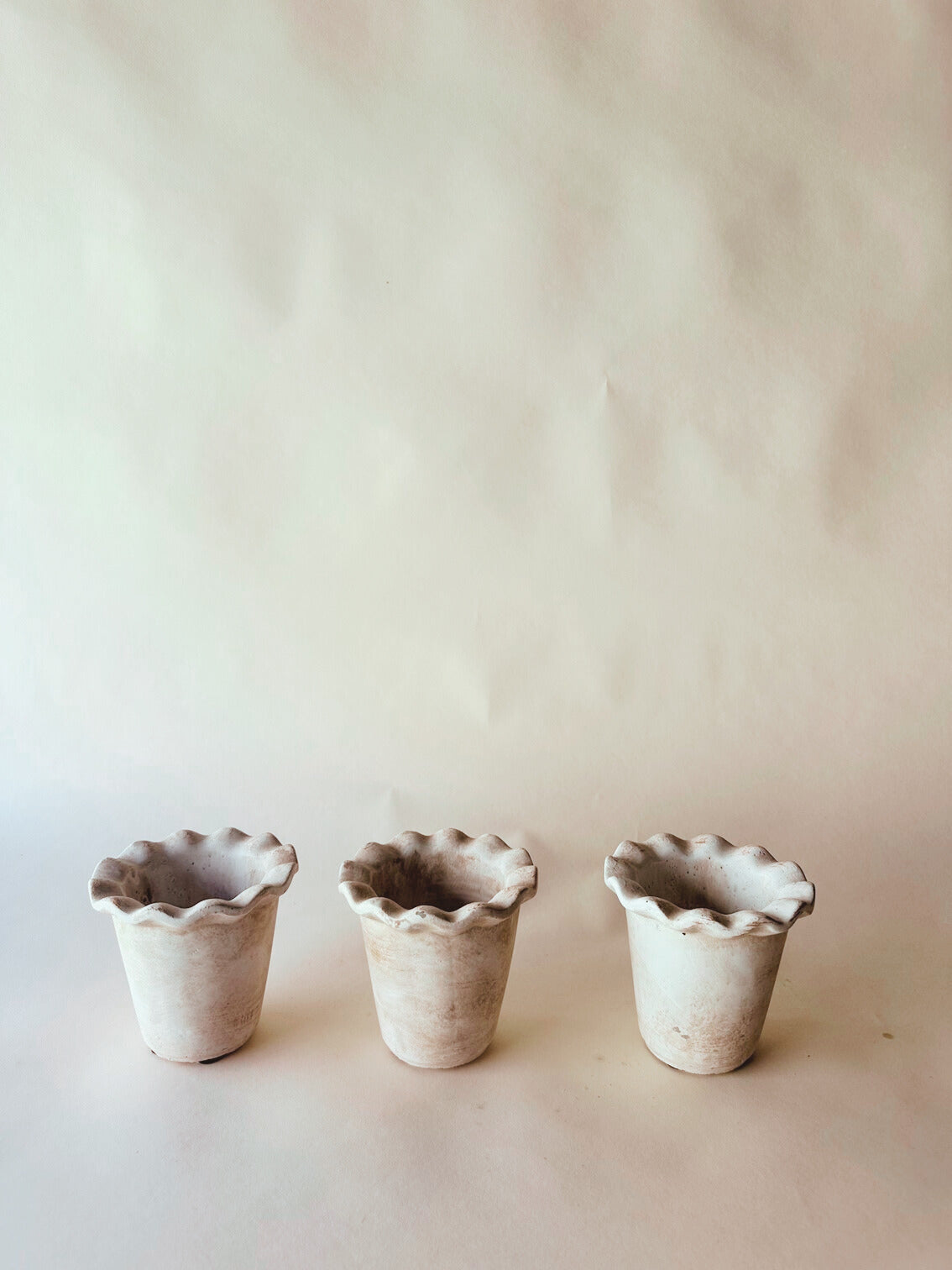Frilly clay pots