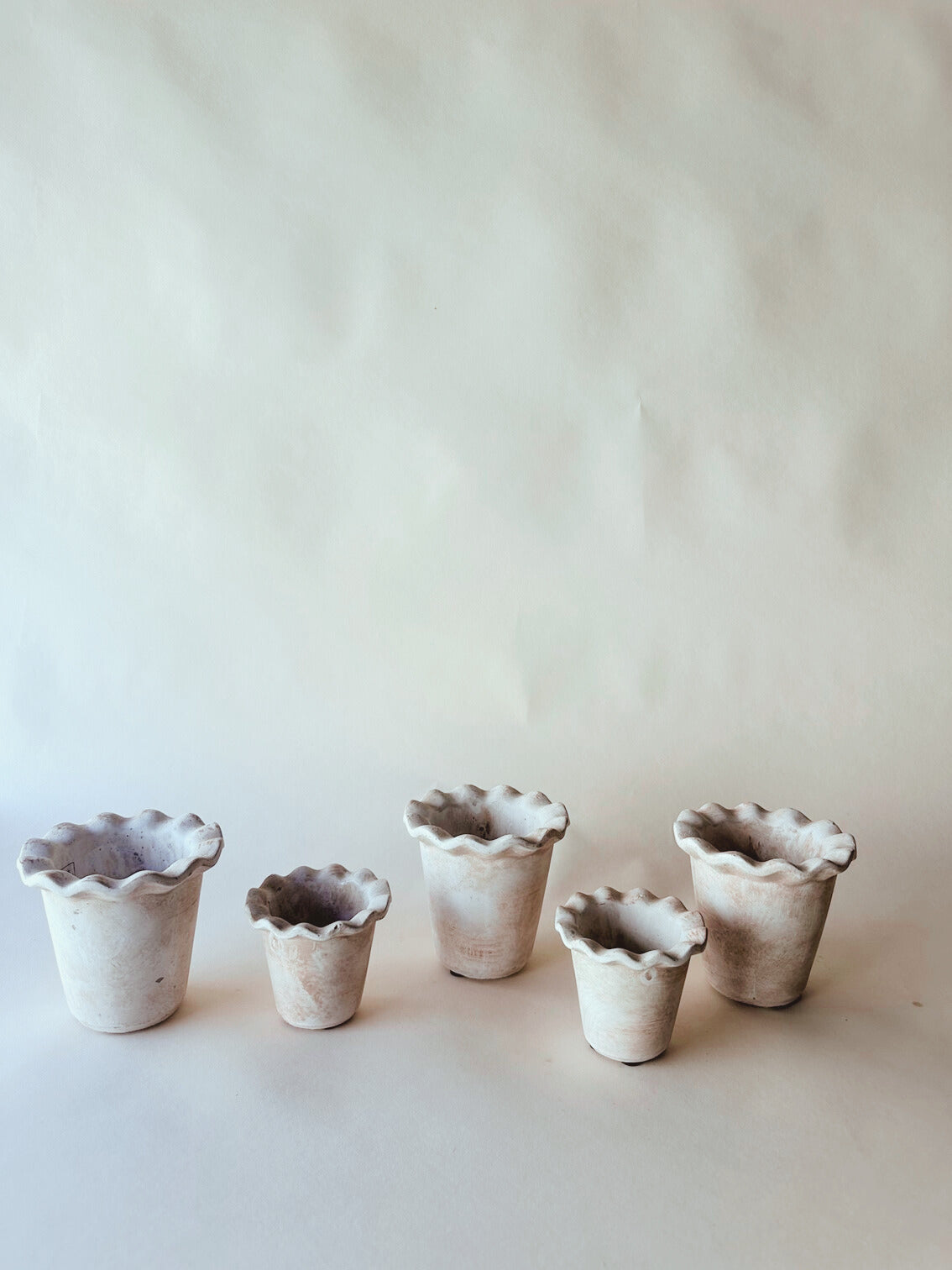Frilly clay pots