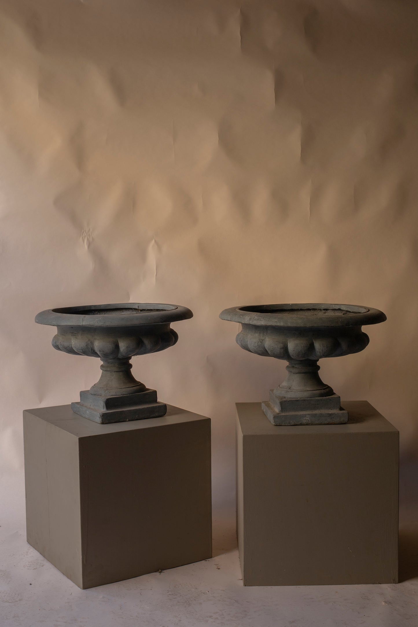 Low grey fiberglass urns