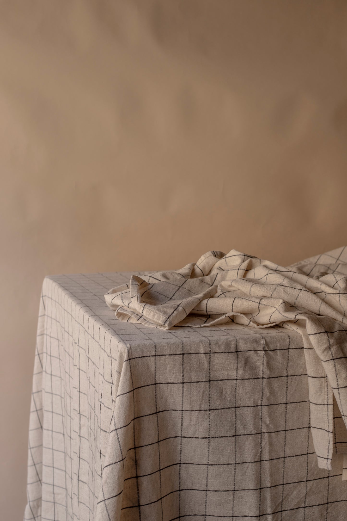 oat coloured check cloth