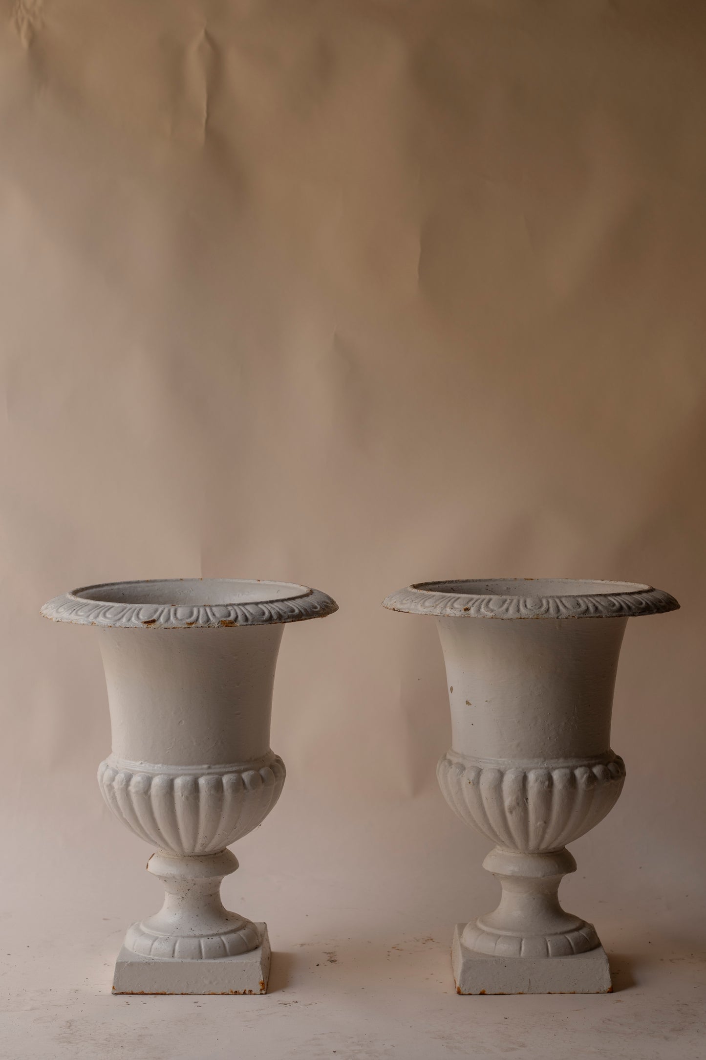 Off white cast iron urn