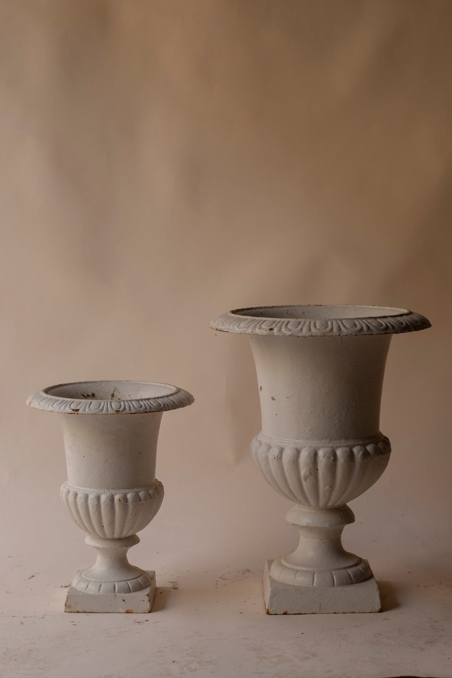 Off white cast iron urn