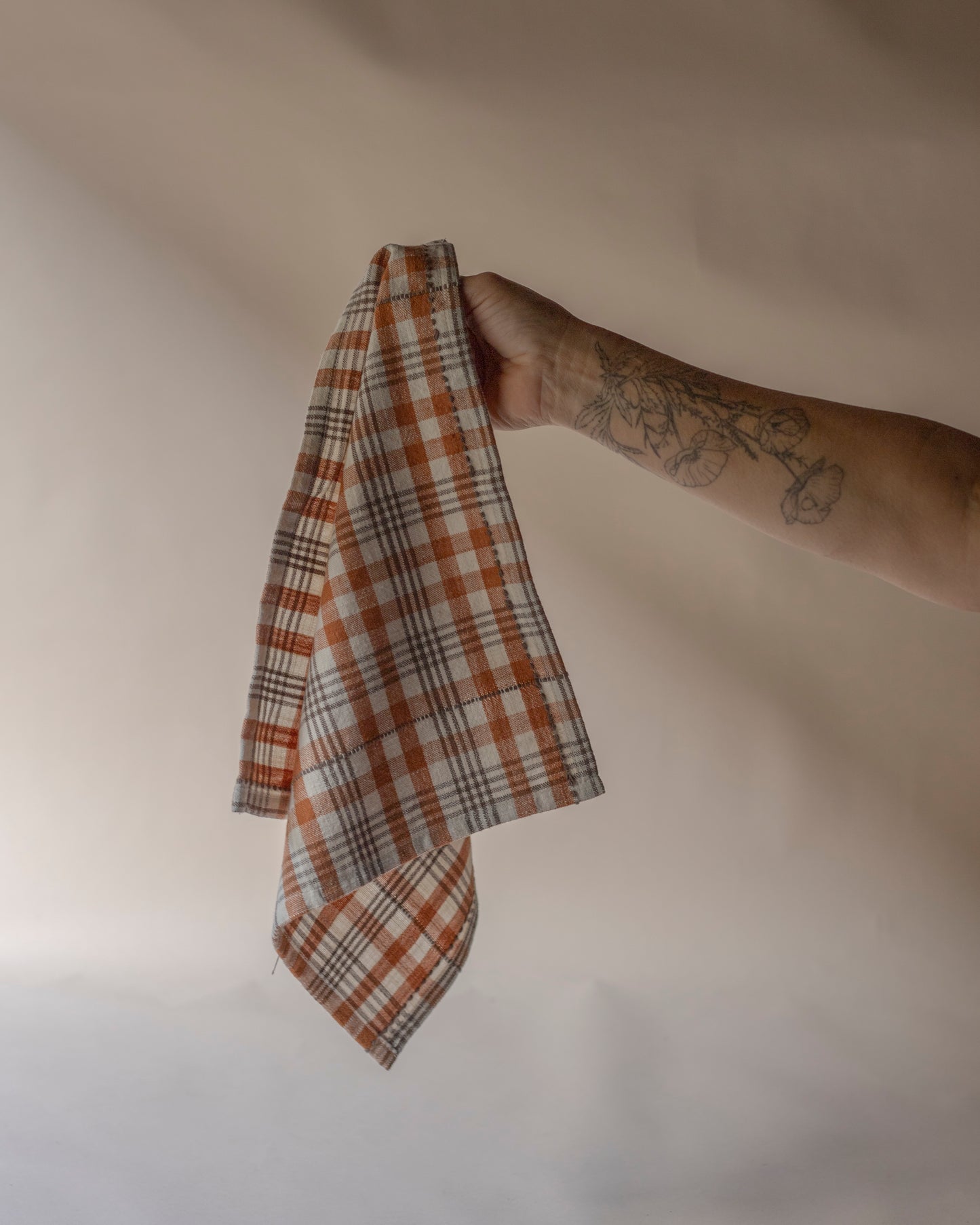 Burnt orange & off white check napkins