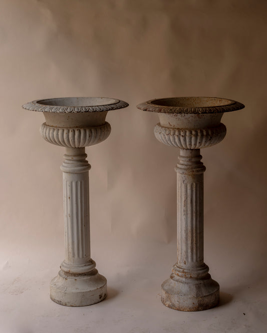Vintage column cast iron urns