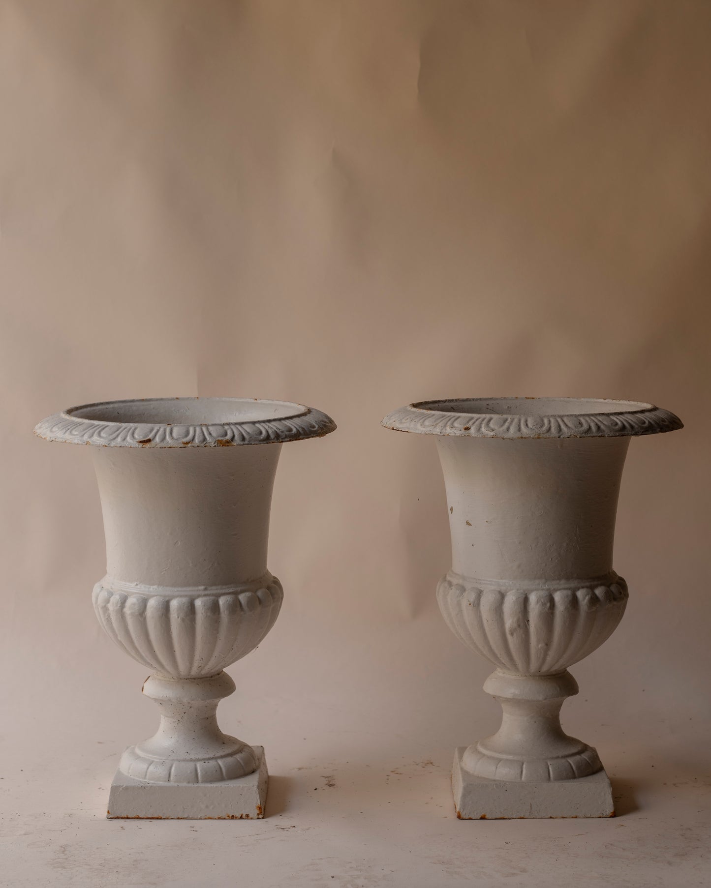 medium white cast iron urn