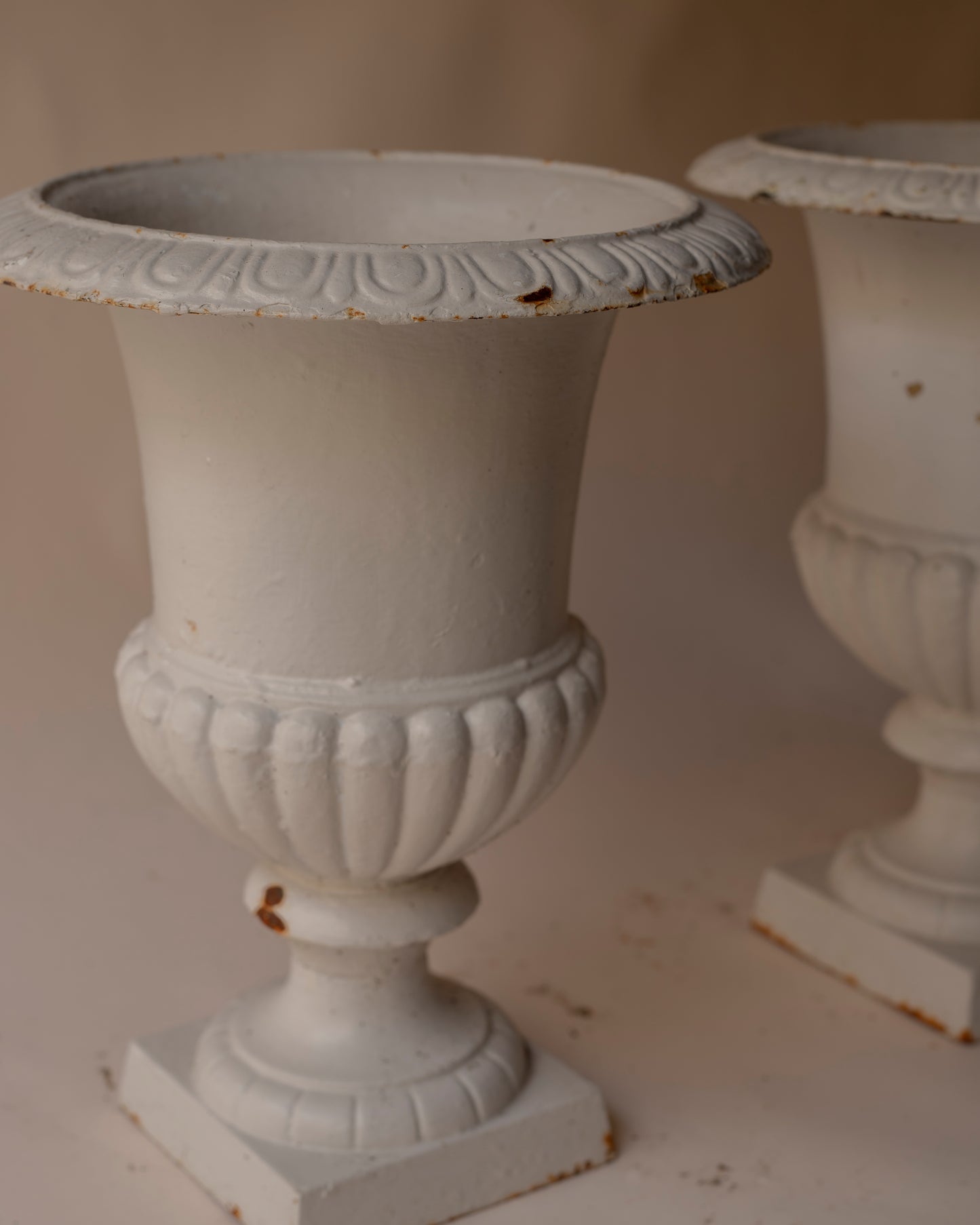 medium white cast iron urn