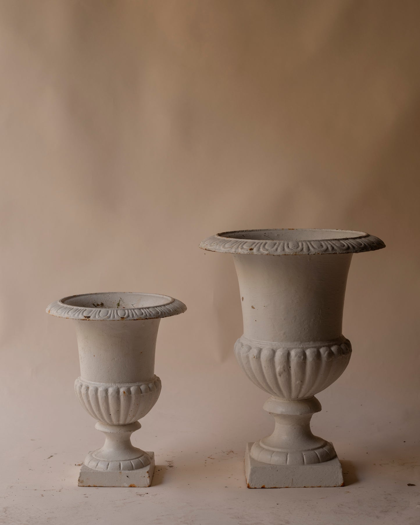 medium white cast iron urn