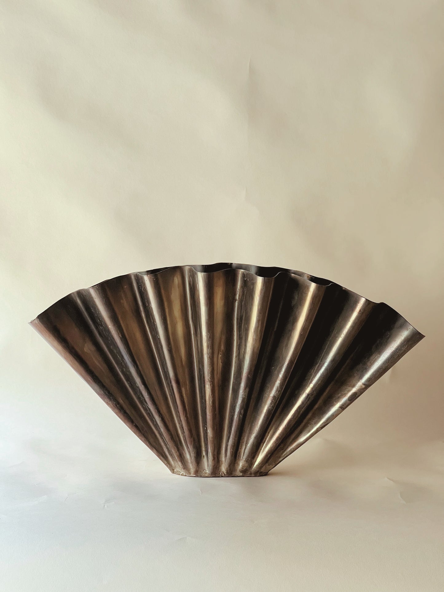 Metal wave vase