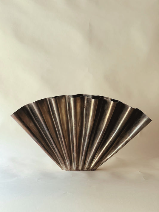 Metal wave vase