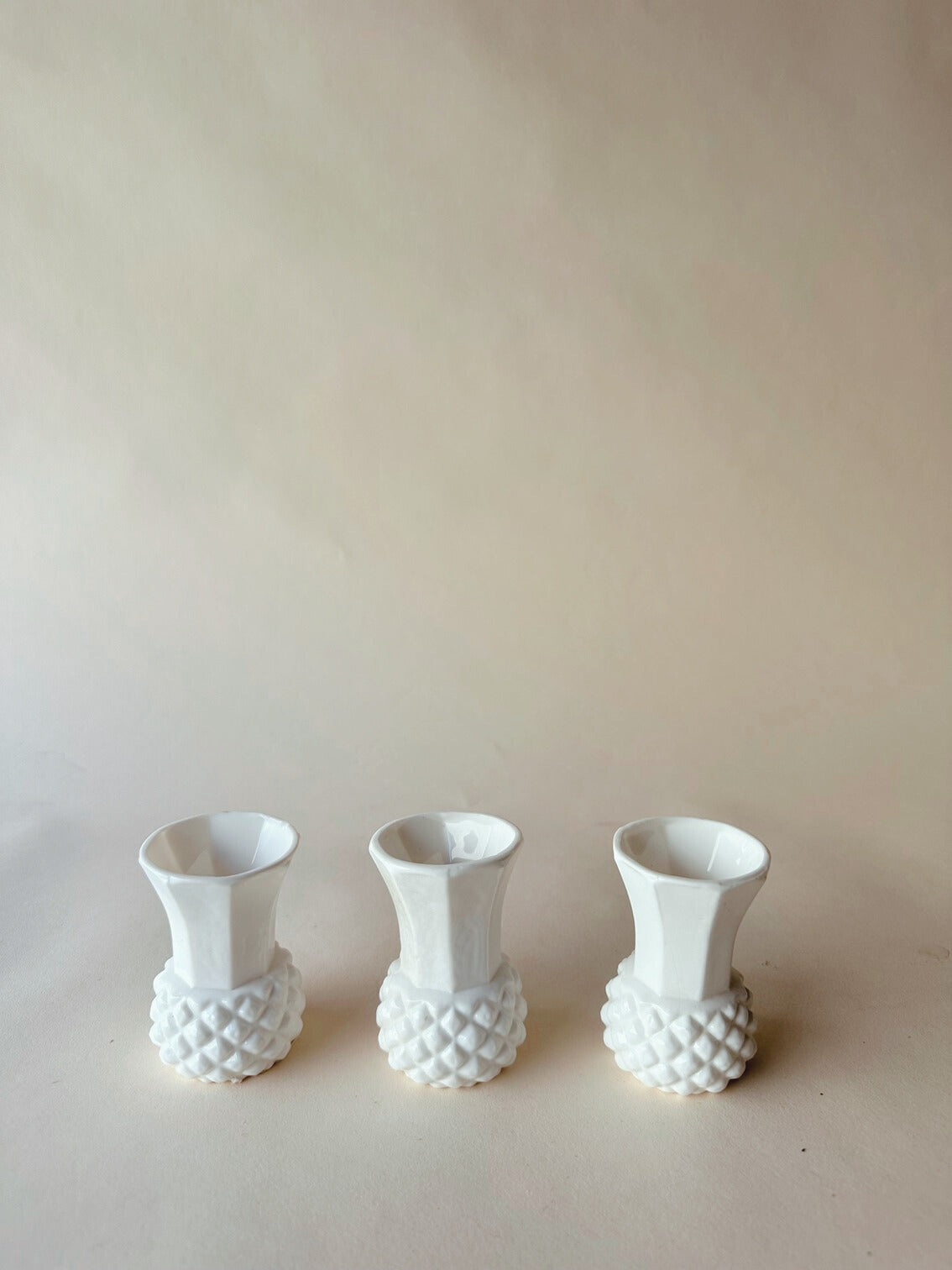 Mini white pineapple bud vases