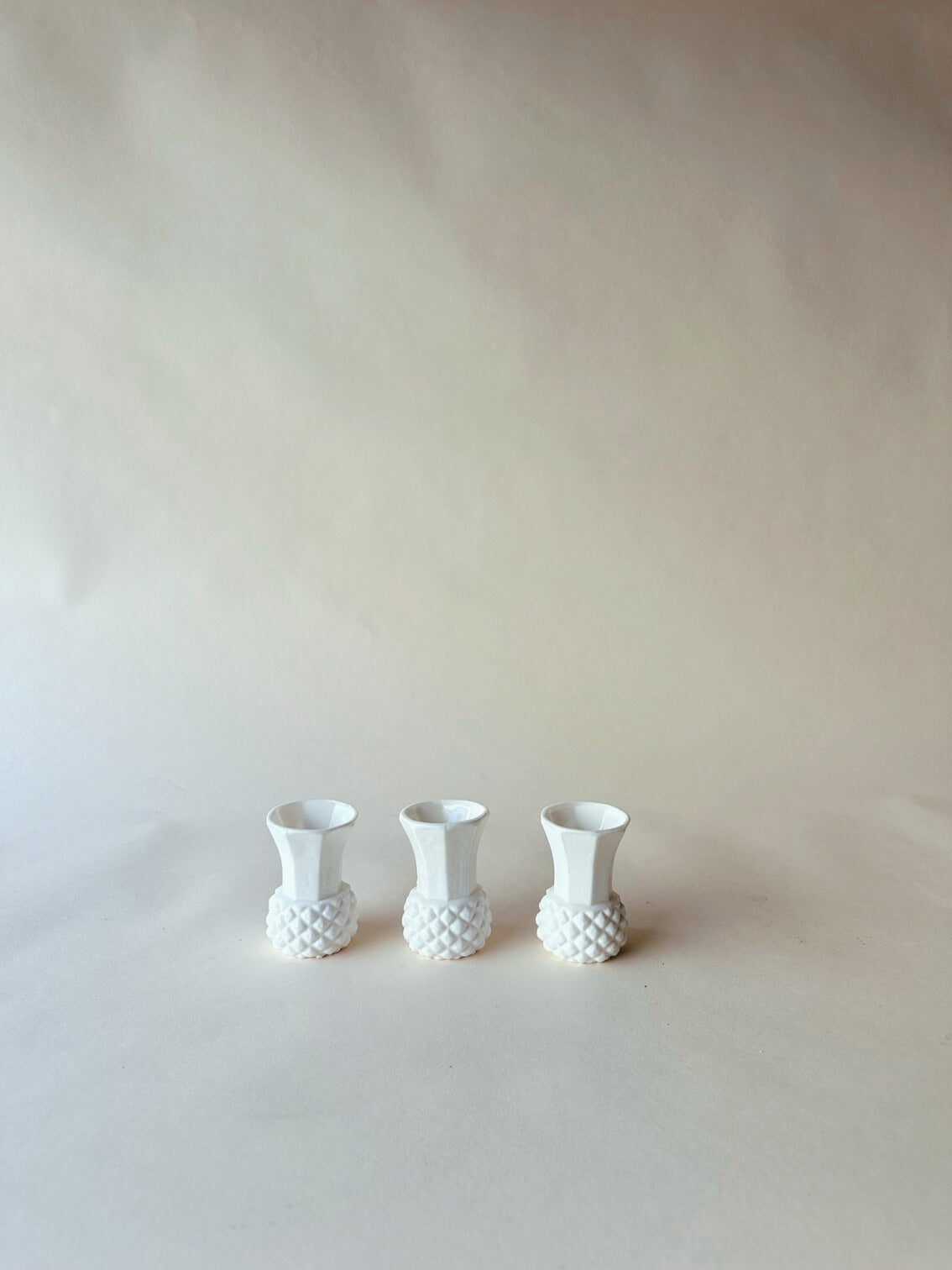 Mini white pineapple bud vases