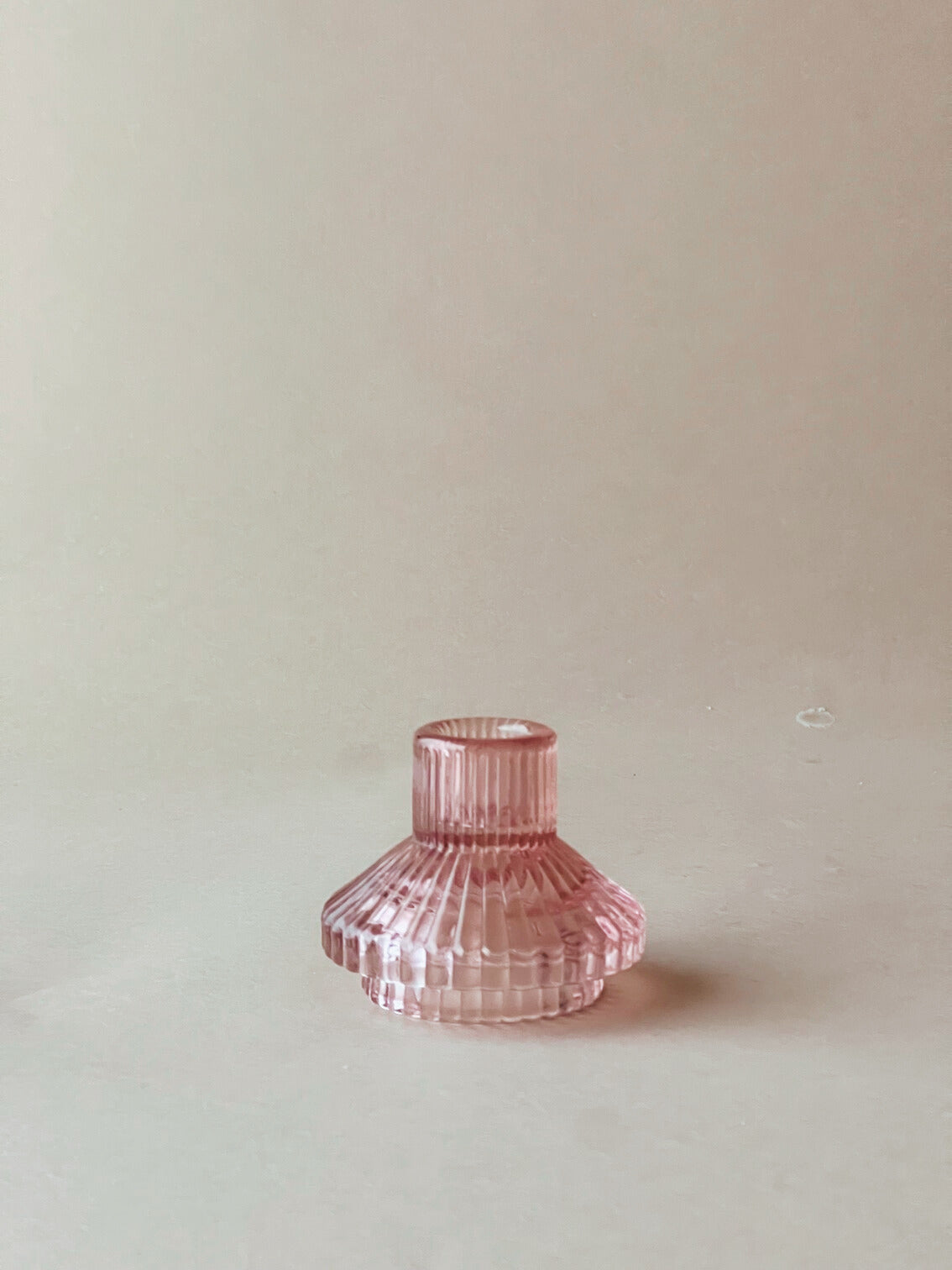Pink glass candlesticks