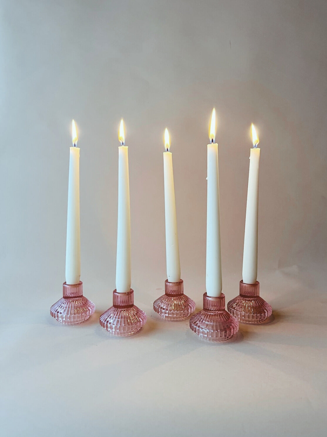 Pink glass candlesticks