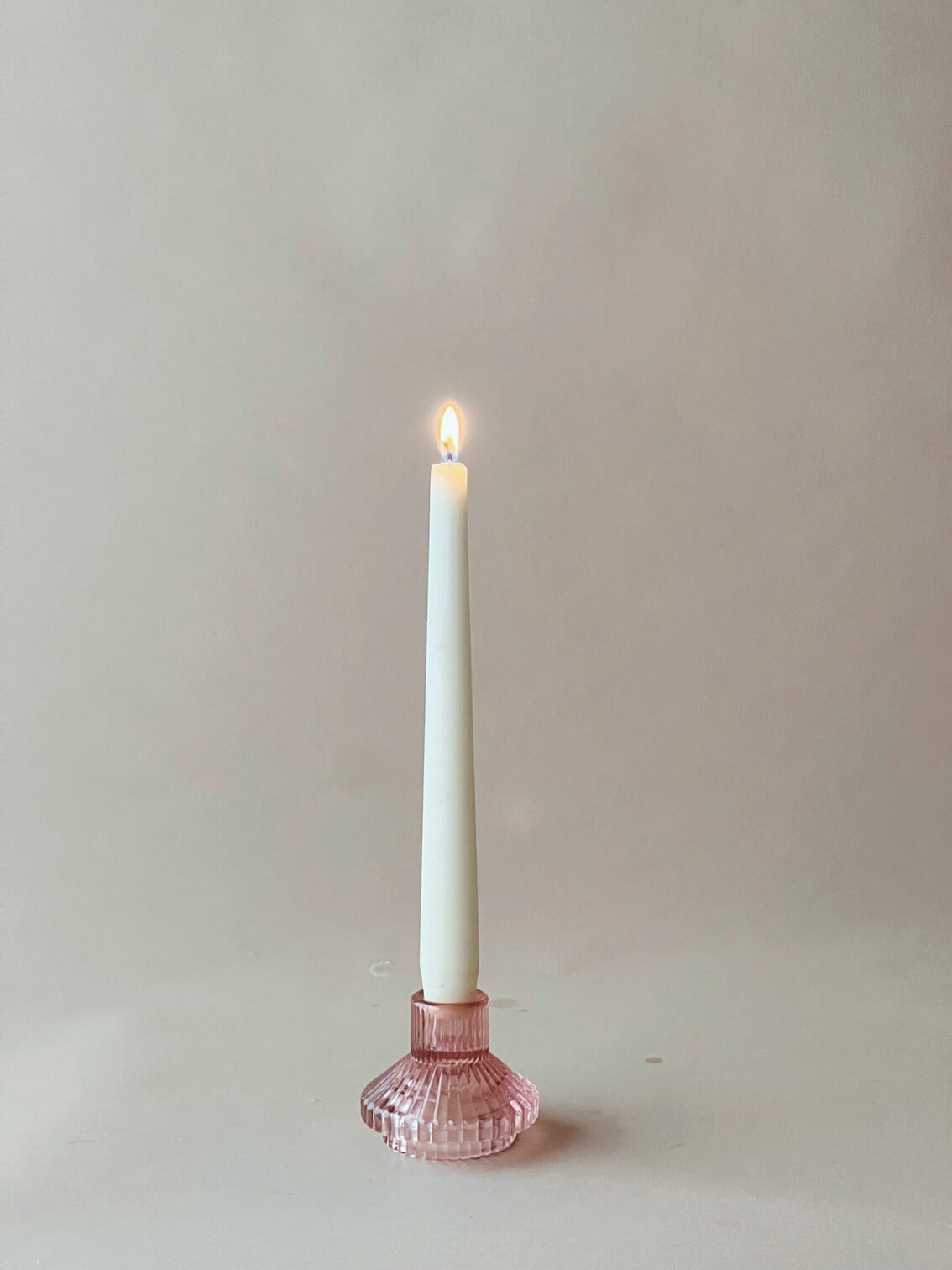 Pink glass candlesticks