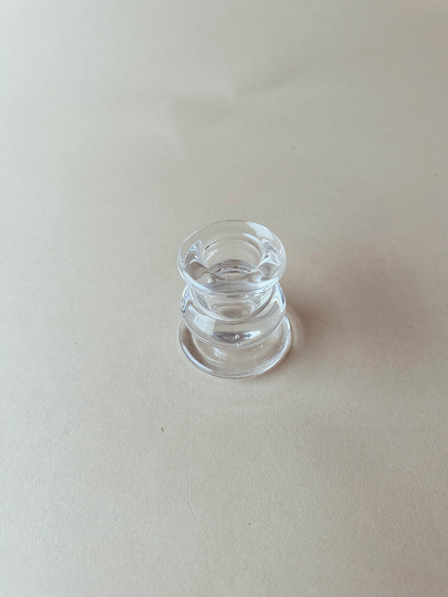 Roly poly glass candlestick holder