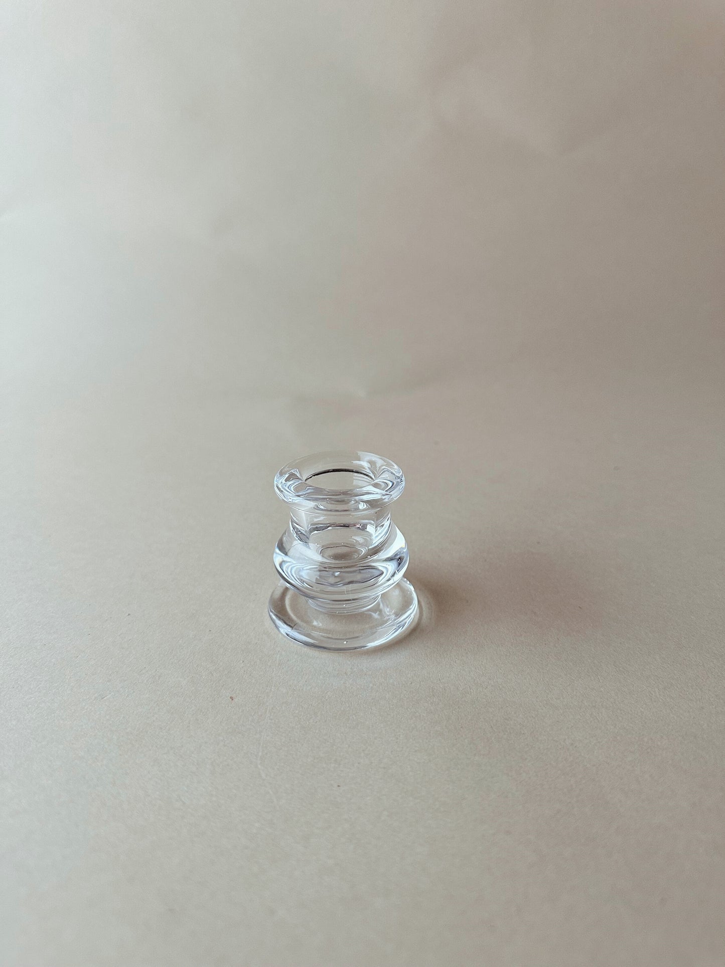 Roly poly glass candlestick holder