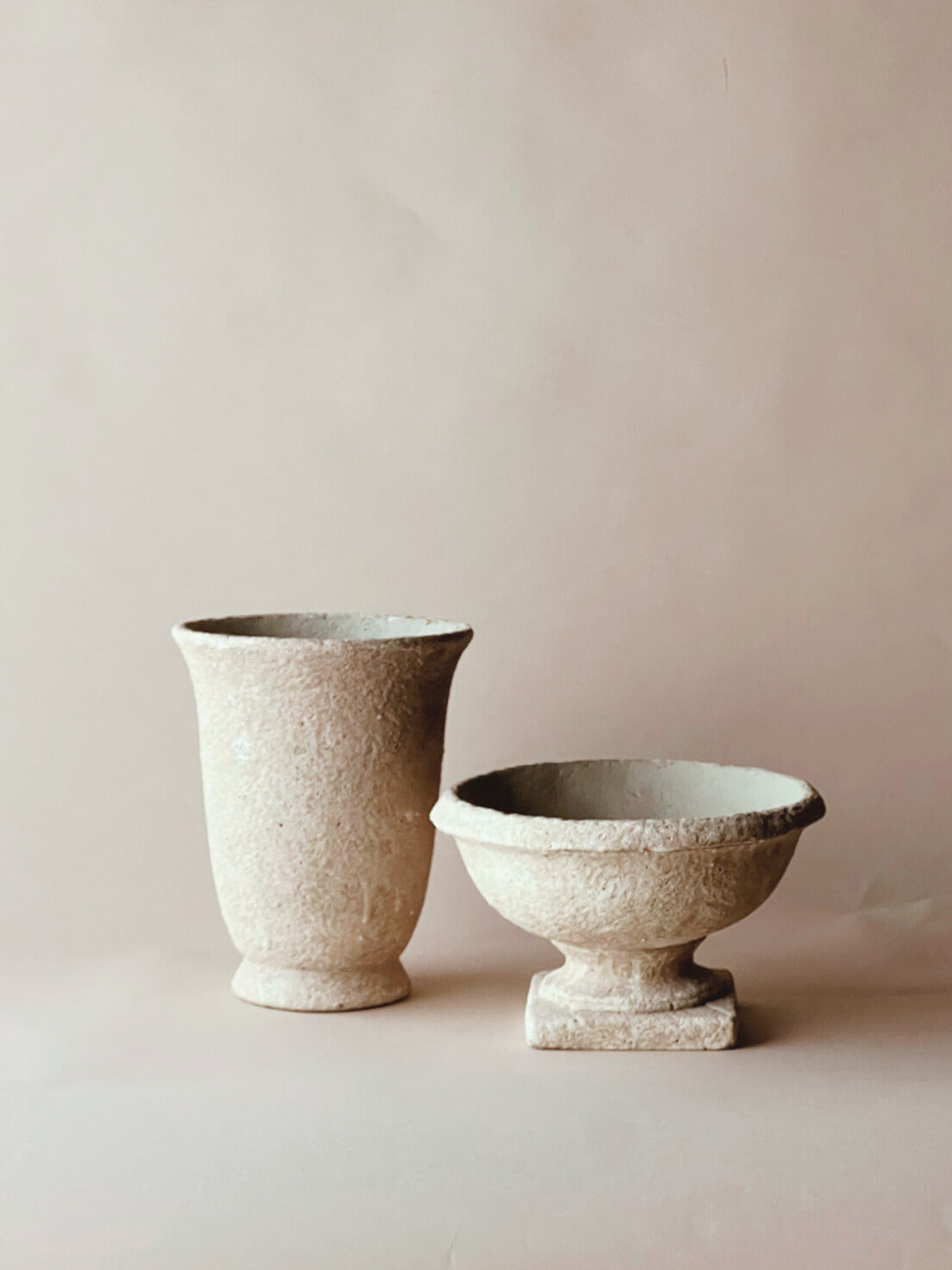 Tall tabletop stone urn