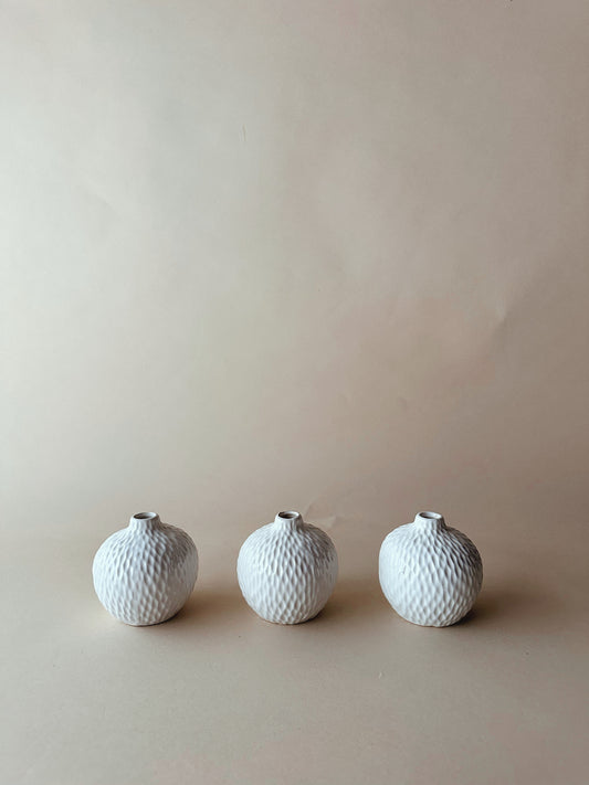 White textured bud vases