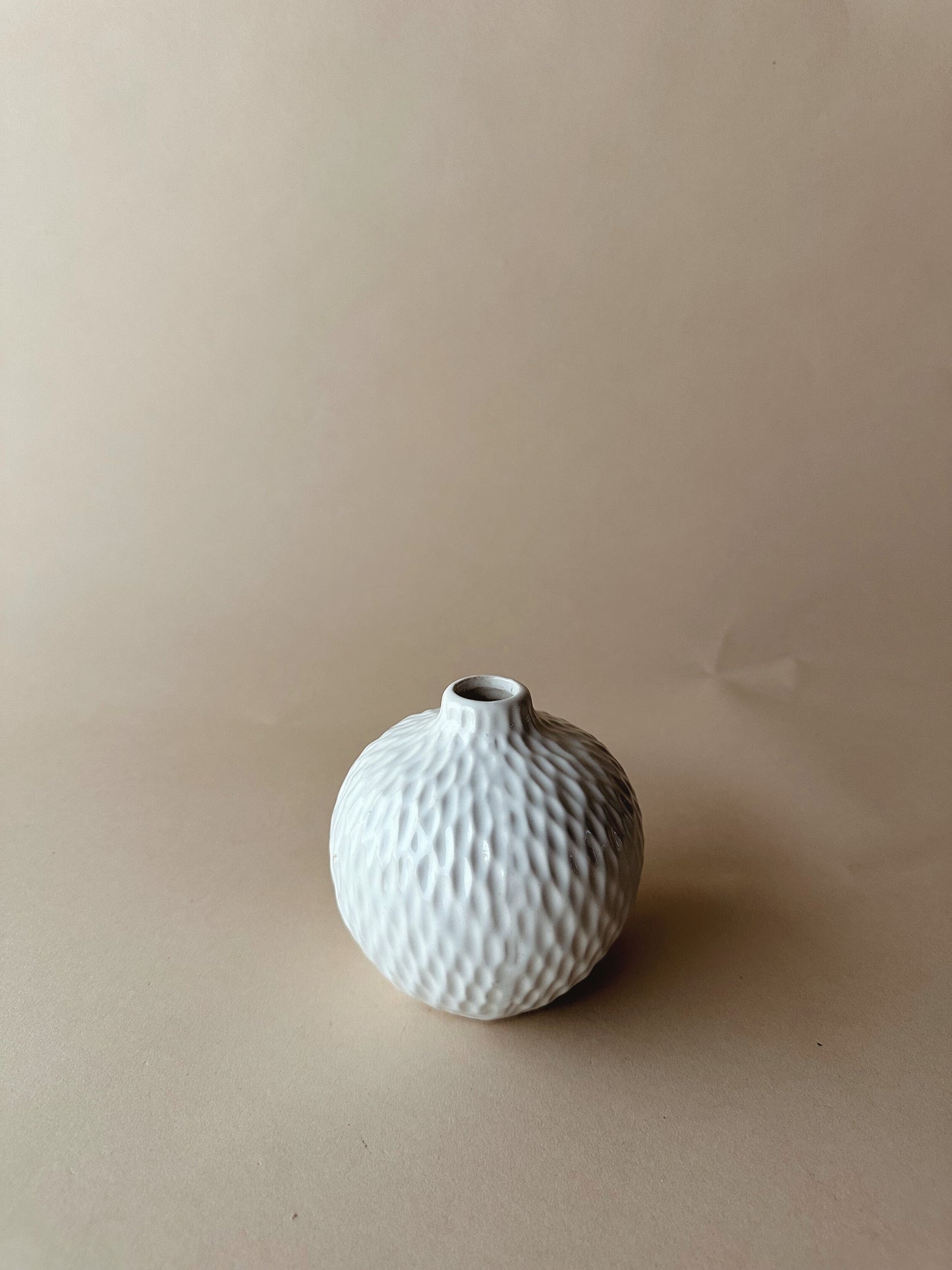 White textured bud vases