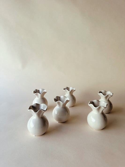 Wavy edged ceramic vases