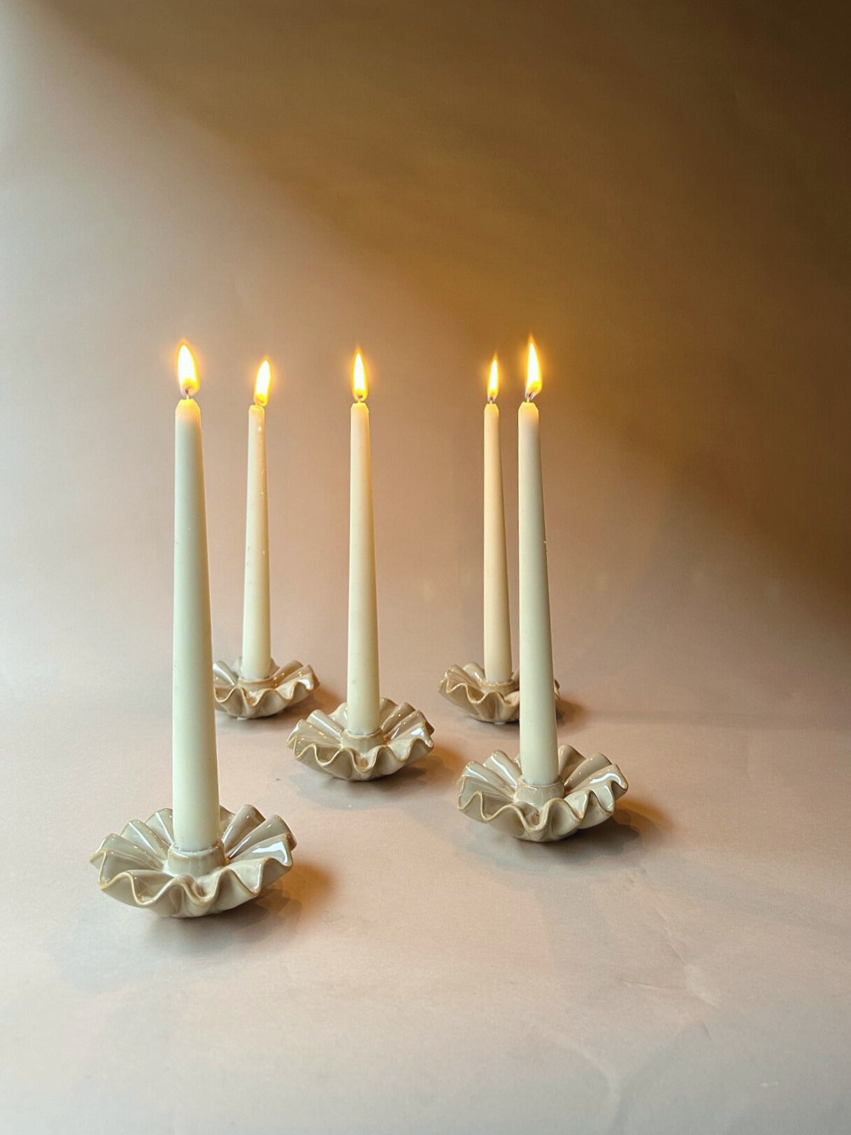 Wavy edged clay candle holders