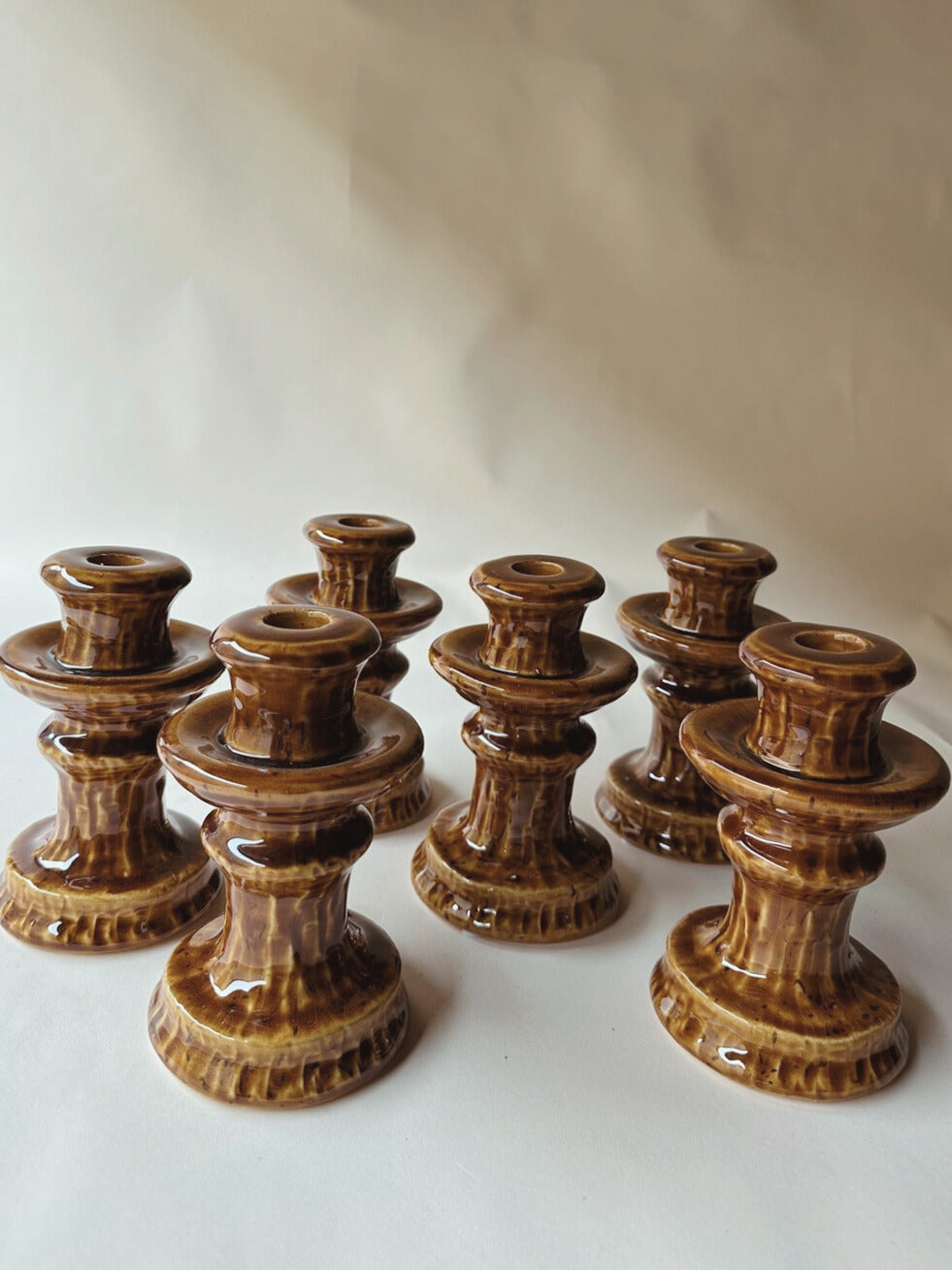 Brown glazed ceramic candlesticks