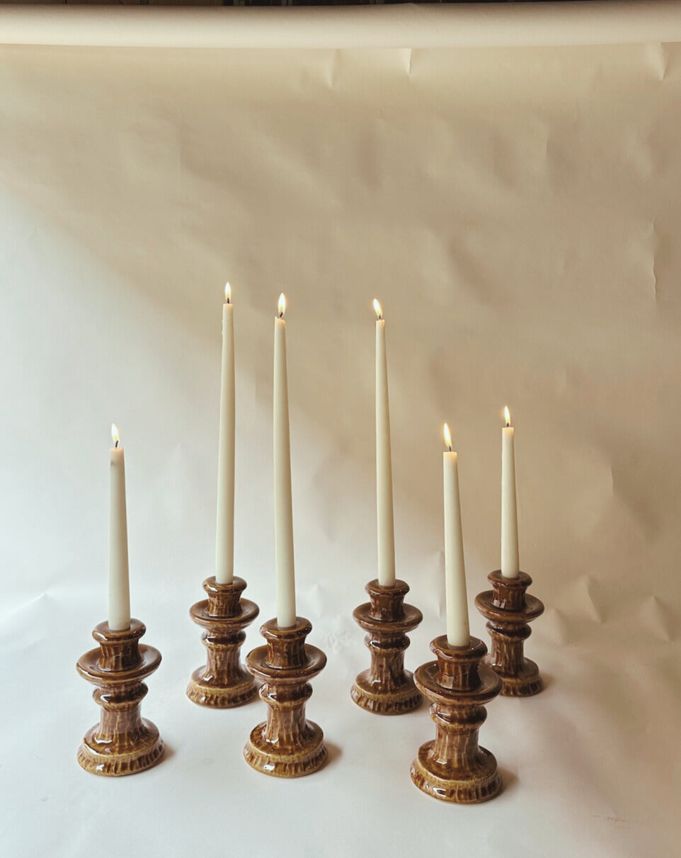 Brown glazed ceramic candlesticks