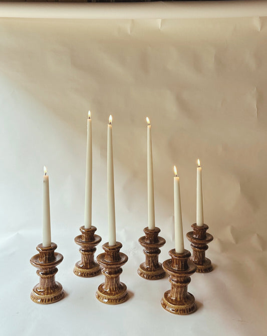 Brown glazed ceramic candlesticks