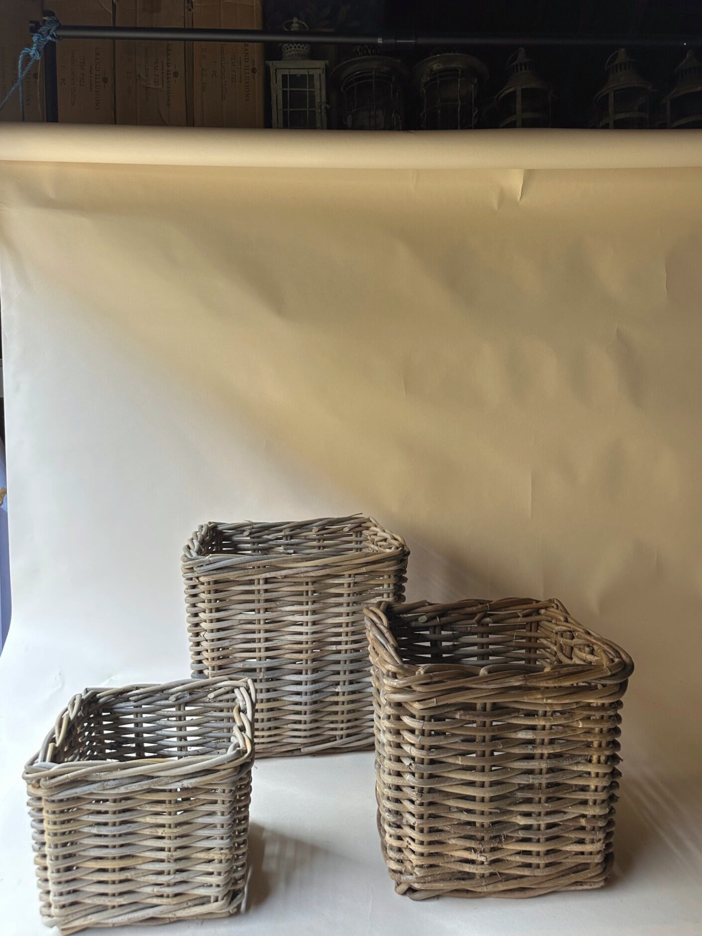 Trio of square wicker baskets